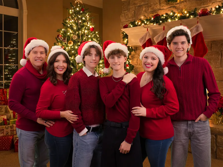 The Sharpe Family singing together at home at Christmas