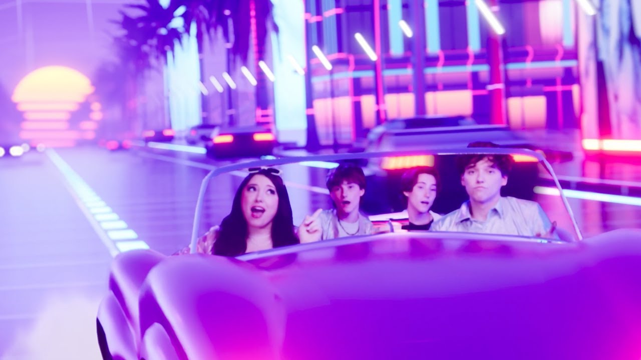 Samantha, Logan, Aidan and Connor riding together in the BTW music video